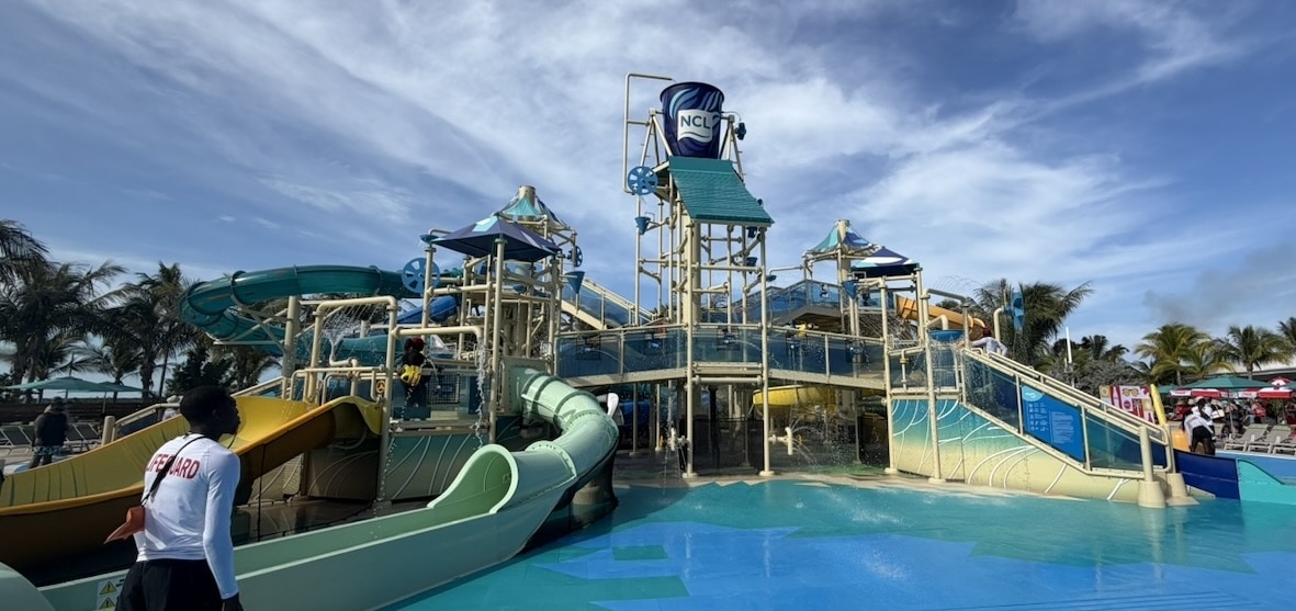 NCL Great Tides Water Park - Splash Cay family water play area with bucket and slides