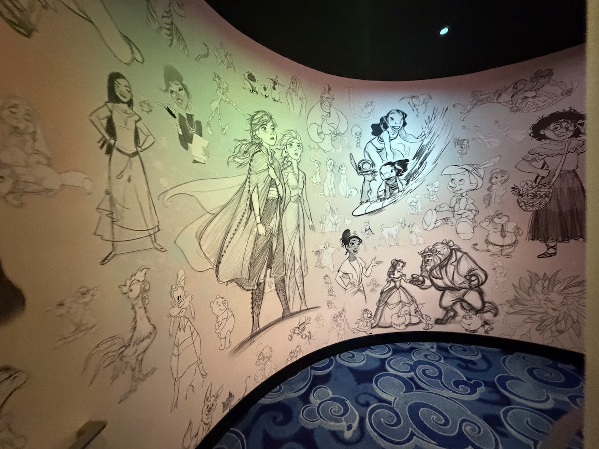 Mural featuring sketch drawings of various Disney characters