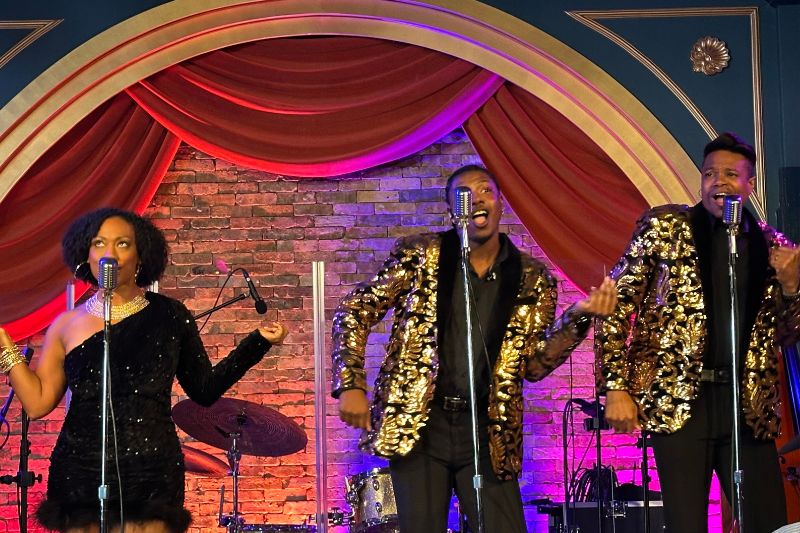 Velvet Soul performs on stage at Hurly-Burly Disney's BoardWalk 