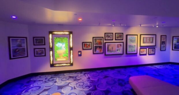 animated poster screen smong disney animation stills on a wall