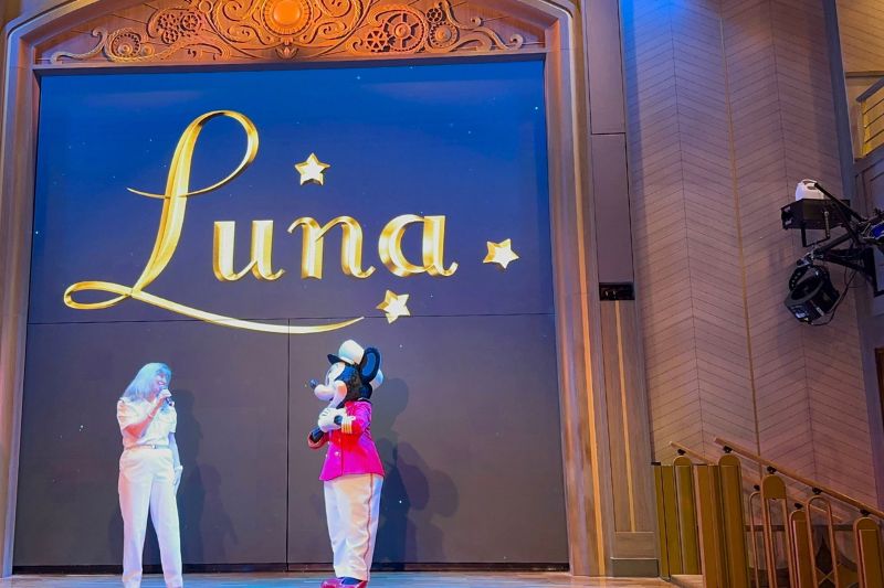 Disney Wish cruise director Kara Boyd with Captain Minnie at Luna