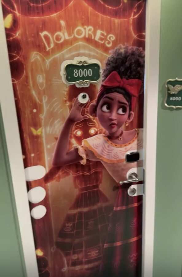 Dolores-from-Encanto-door-clue-aboard-Disney-Believe-reveal-cruise-Photo-by-Matt-Roseboom.