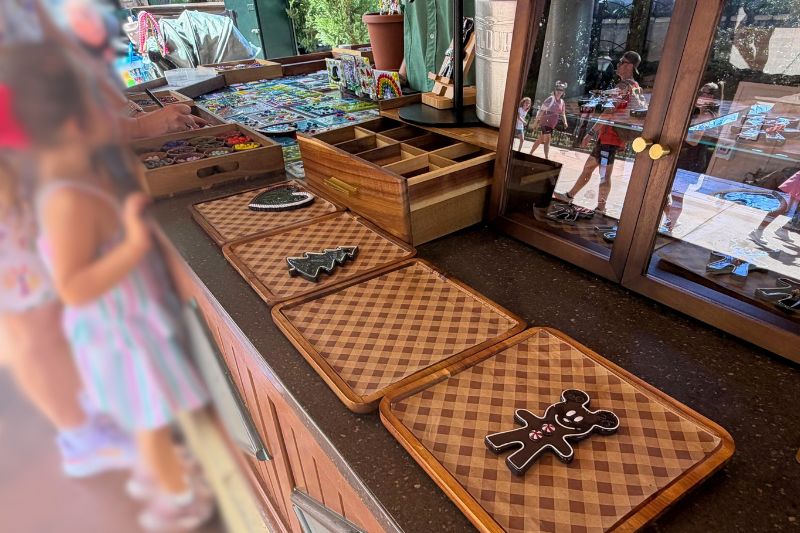 Glass Gingerbread Ornament station and trays at Epcot Germany pavilion