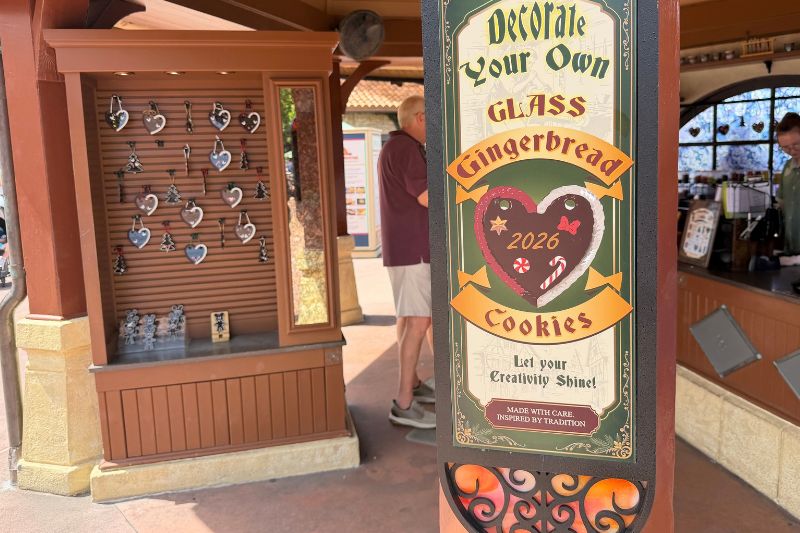 Glass Gingerbread Ornament station at Epcot Germany pavilion signage
