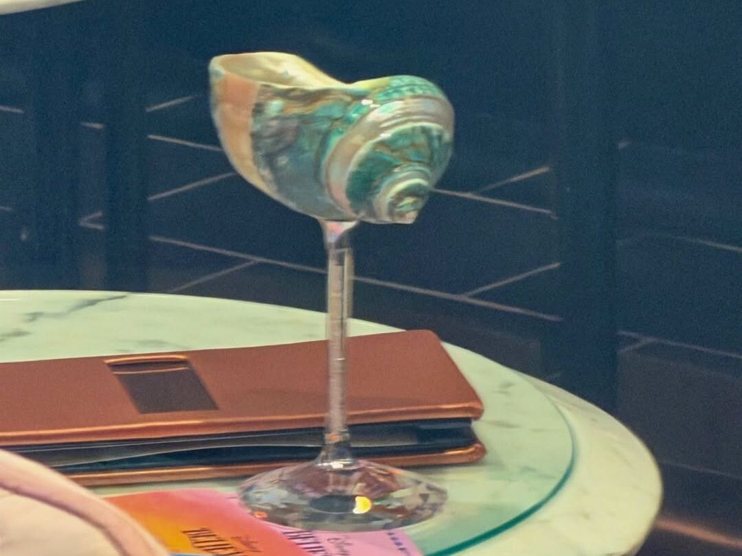 Seashell specialty drink aboard Disney Believe reveal cruise