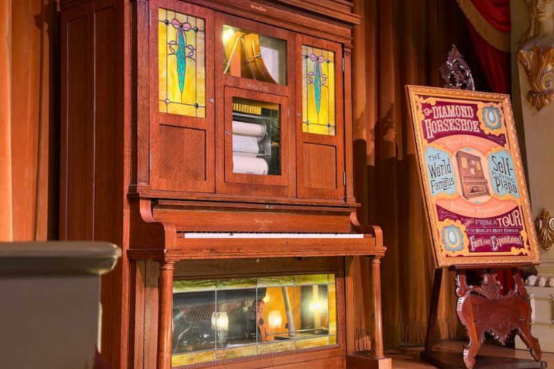 The Diamond Horseshoe player-piano on stage