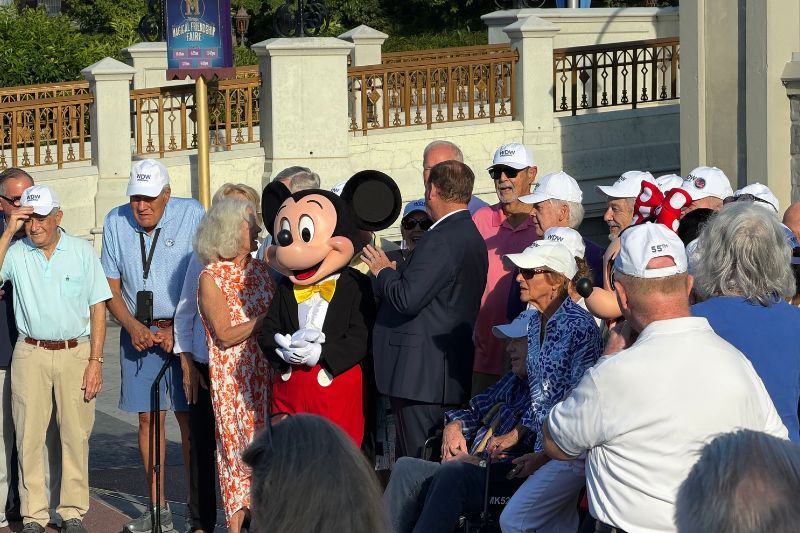 Walt Disney World 55th anniversary original year cast members with Mickey Mouse and Minnie Mouse
