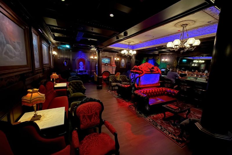 Wide view of Haunted Mansion Parlor on Disney Treasure